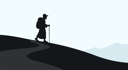 Obraz premium Silhouette of a male pilgrim carrying a backpack and using a walking staff while hiking up a winding path on a mountain ridge against a clean minimalist landscape background.