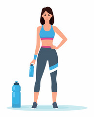 Fit Young Woman Standing With Water Bottle After Workout in Athletic Clothing and Sneakers © immortality