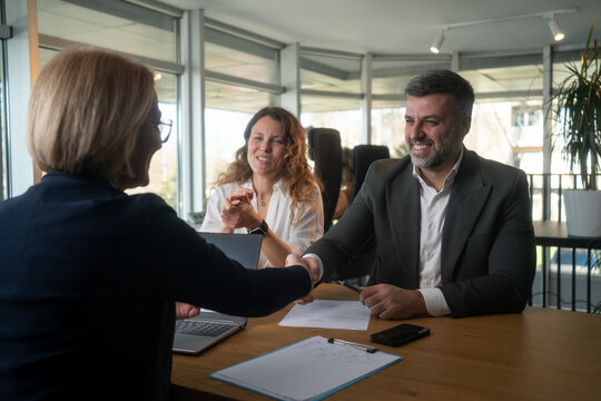 Family couple consultations with a lawyer or insurance agent.