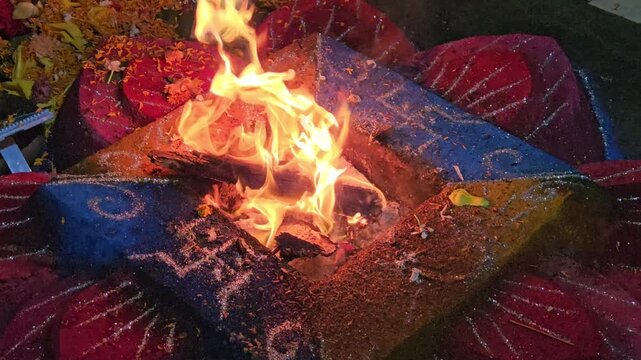Sacred Fire Ritual Havan Kund in Hindu Ceremony, Holy Flame with Offerings and Gheee, Spiritual Yajna Ritual, Devotional Worship and Religious Tradition India