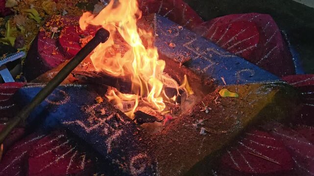 Sacred Fire Ritual Havan Kund in Hindu Ceremony, Holy Flame with Offerings and Gheee, Spiritual Yajna Ritual, Devotional Worship and Religious Tradition India
