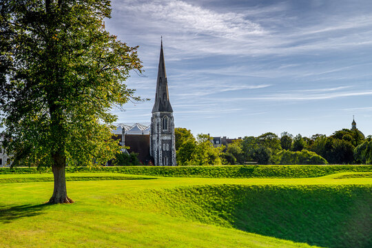 St Alban's Church in green area in Indre By district of Denmark.