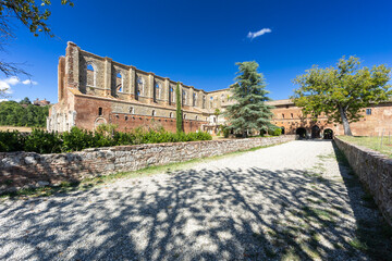 Fototapeta premium San Galgano Abbey ruins under blue sky in Tuscany