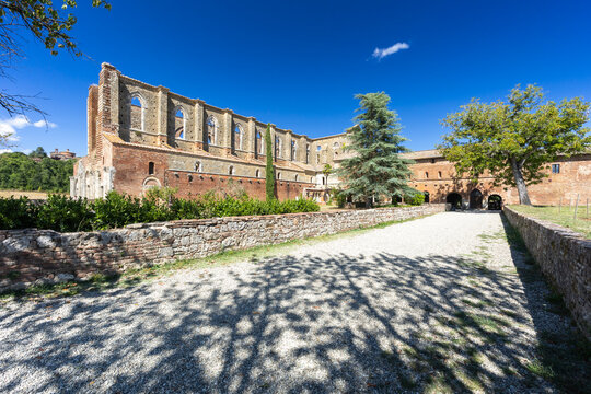 San Galgano Abbey ruins under blue sky in Tuscany