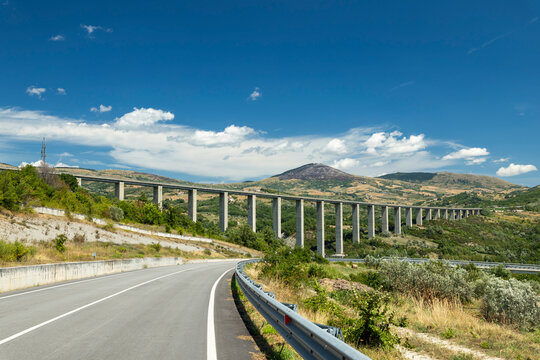 Highway viaduct extending across valley in Agnone, Italy