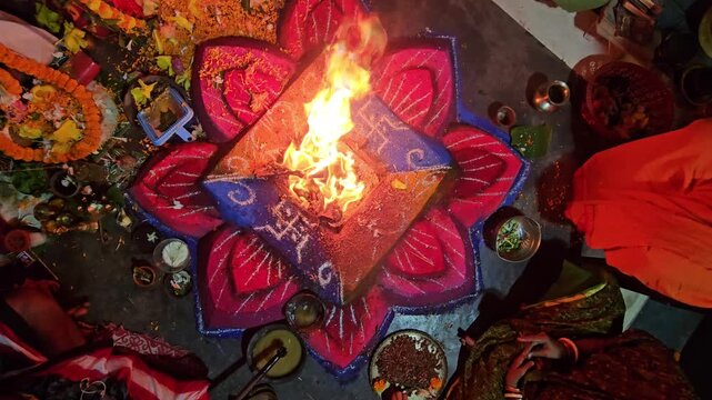 Indian Religious Ritual Fire Ceremony Top View with Rangoli Design, Spiritual Worship Scene, Sacred Festival Tradition, Hindu Cultural Celebration, Devotional Ceremony India 4K Footage