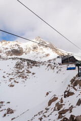 Fototapeta premium ski lift in the alps Cerro Catedral San Carlos de Bariloche Patagonia Argentina, next to the Andes Mountains, base city for skiing in the mountains