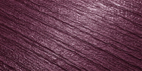 Obraz premium A detailed close up view of a dark purple textured surface with diagonal lines and metallic sheen