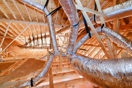 Ductwork installation in residential building under construction
