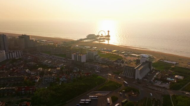 Aerial view of Scheveningen Beach in city Hague, Scheveningen Pier and famous Ferris wheel skyview de Pier