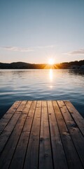 Fototapeta premium Weathered wooden jetty framing a bright sunrise over calm lake with sunburst reflection serene morning waterfront view