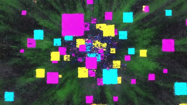 Vibrant abstract geometric shapes explode outwards from a dark, textured background.