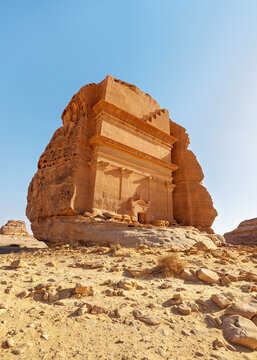 Tomb Lihyan Son of Kuza or Qasr al-Farid at Hegra, Saudia Arabia - most popular landmark in Mada'in Salih archaeological site, bright sunny day