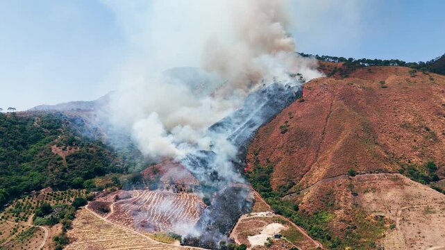Aerial view of raging wildfire and air pollution in tepic nayarit, mexico