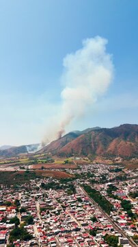 Aerial view of smoke from a wildfire causing air pollution over tepic, nayarit mexico