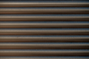 Fototapeta premium Dark metal rolling shutters texture background
