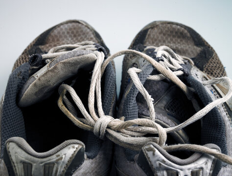 Worn out running shoes