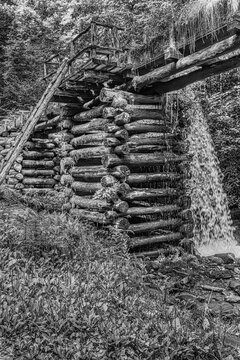 Explore the Timeless Beauty of Historical Water Structures: Rustic Log Water Flume at the Mingus mill in the Smoky Mountains National Park, USA