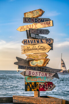 Discover Global Destinations: Vibrant Signpost by the Sea for Travel Inspiration, Key West, Florida, USA