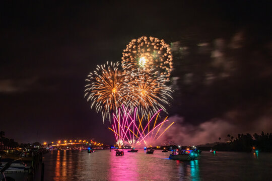 Spectacular Fireworks Display Over a Vibrant Night Sky in Florida, Indian River Lagoon, New Smyrna Beach, USA