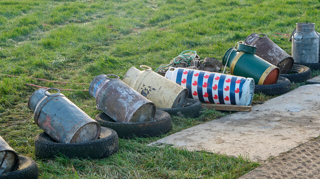 Old milk cans in a row. Carbide shooting or carbidschieten in dutch is a tradition in the Netherlands and usually takes place on New Year's Eve. The goal is to make a loud bang after the carbide	