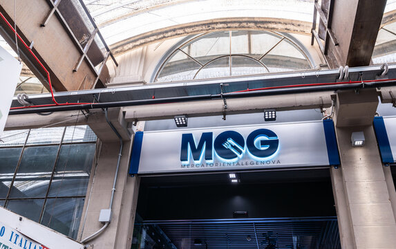Genoa, liguria, italy. May 18, 2024. Mercato orientale genova mog sign visible, highlighting the entrance to genoa's food market within its historic architectural structure
