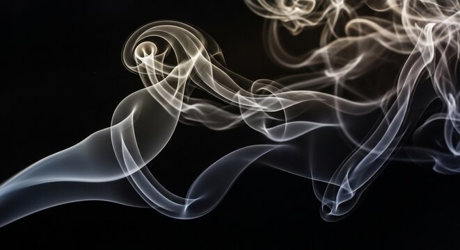 Abstract smoke swirls on black background