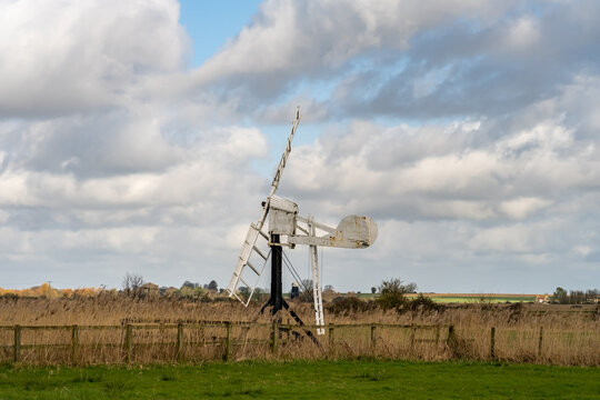 Wooden windpump in the marshes in the Norfolk countryside