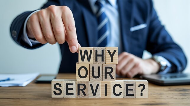Business professional arranging wooden blocks spelling out why our service question