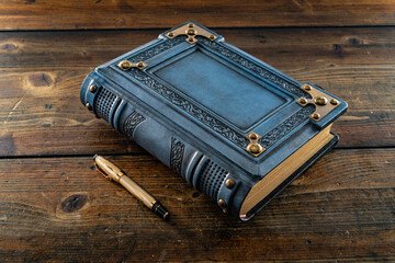 vintage leather book on the wooden table 