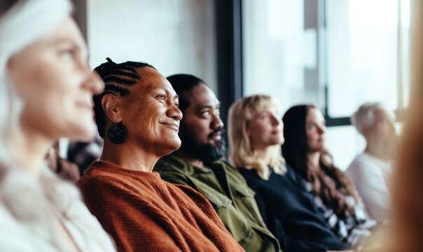 Maori Pacifica diversity New Zealand workplace. Authentic Maori and Pasifika community hui in a modern office. Diverse colleagues collaborating in a supportive New Zealand workplace setting