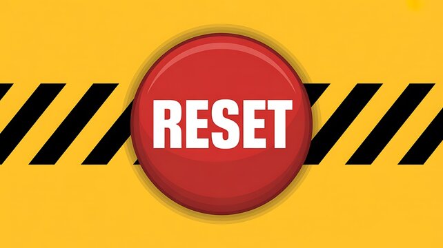 Red reset button with black stripes on yellow background