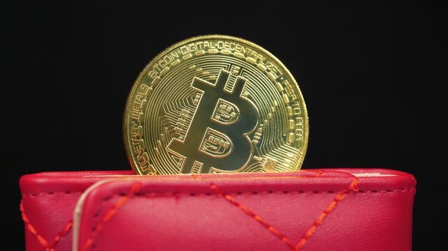 Cryptocurrency, gold bitcoin in crypto wallet. Bitcoin in wallet. Blockchain technology, bitcoin mining concept