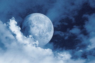 Fototapeta premium Big full moon among clouds in night sky