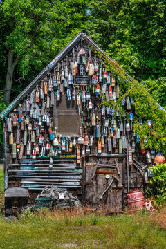 Discover the Charm of a Nautical Fisherman's Shack Decked with Colorful Lobster Buoys, Annisquam, Massachusetts, USA