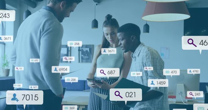 Vertical video: Team tapping tablet causing floating data badges while reviewing business KPIs
