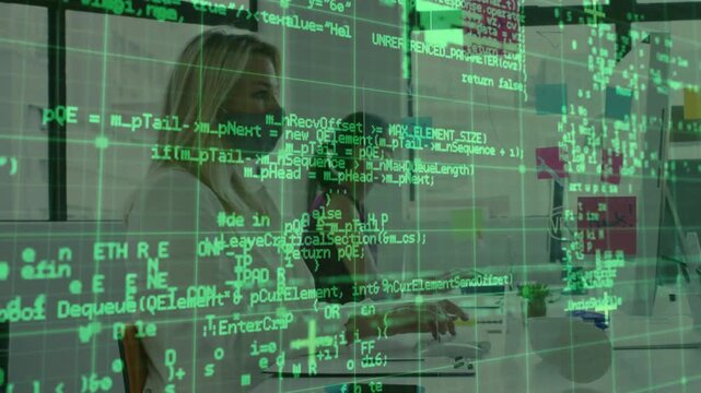 Woman typing at tech desk initiating green code overlay while coworker joining, building software