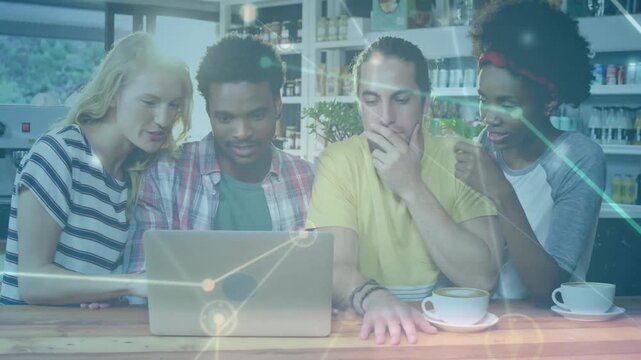 Vertical video: Laptop typing causing node overlay while four teammates leaning in, working on idea