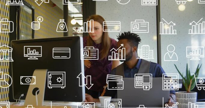Woman leaning, pointing at screen, man adjusting laptop, reviewing finance, white icons floating