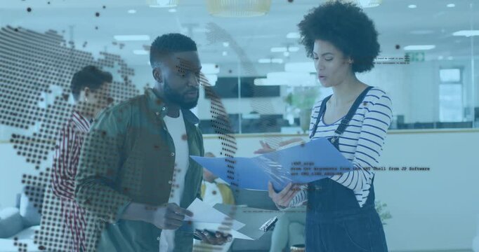 Woman opening blue folder pointing while man comparing papers business review dotted map overlaid
