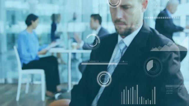 Camera pulling back, man holding tablet reviewing business data while HUD animating over tablet