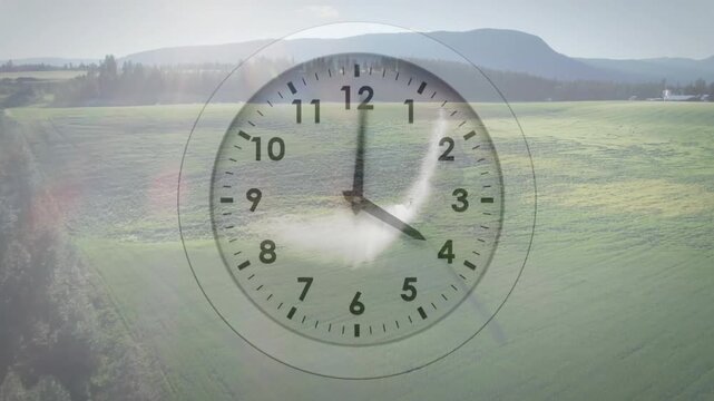Appearing translucent clock starting hands turning over fields, streak moving, showing time-lapse