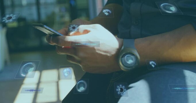 Man tapping smartphone in lounge, activating holographic panels arranging technology dashboard