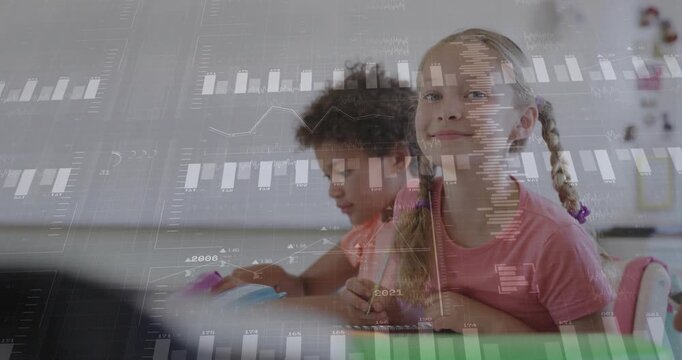 Two students writing and tapping tablet in class, input starting data charts tracking progress