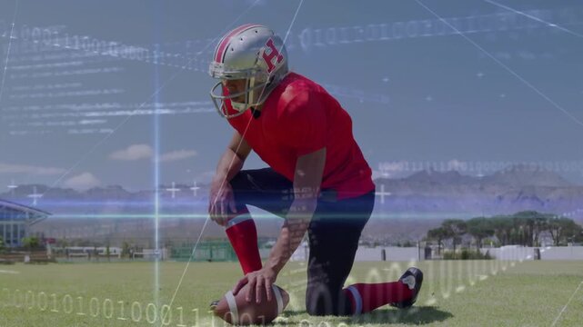 Vertical video: Footballer placing ball opening sports tech overlay scanning stats priming snap