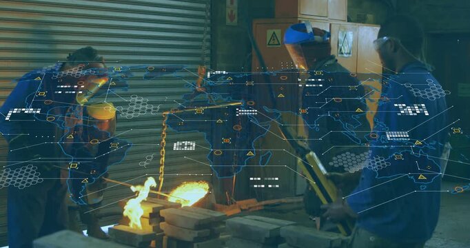 Foundry crew using remote guiding hoist pouring molten metal into molds to cast blue overlay rising