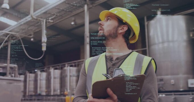 Camera panning to male technician inspecting plant tanks, noting on clipboard with data overlay