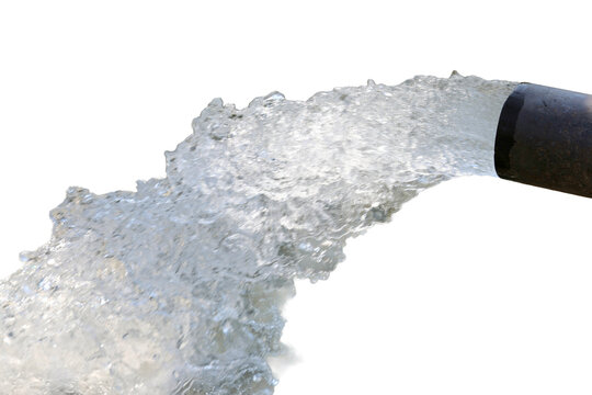 Isolated Water stream flowing out of a dark pipe with high pressure against a plain black background