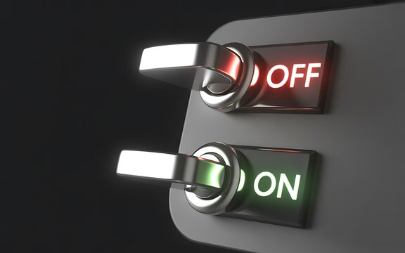 Close-up of on and off toggle switches on dark background