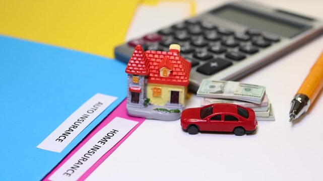 Concept of calculating home and auto insurance policy costs